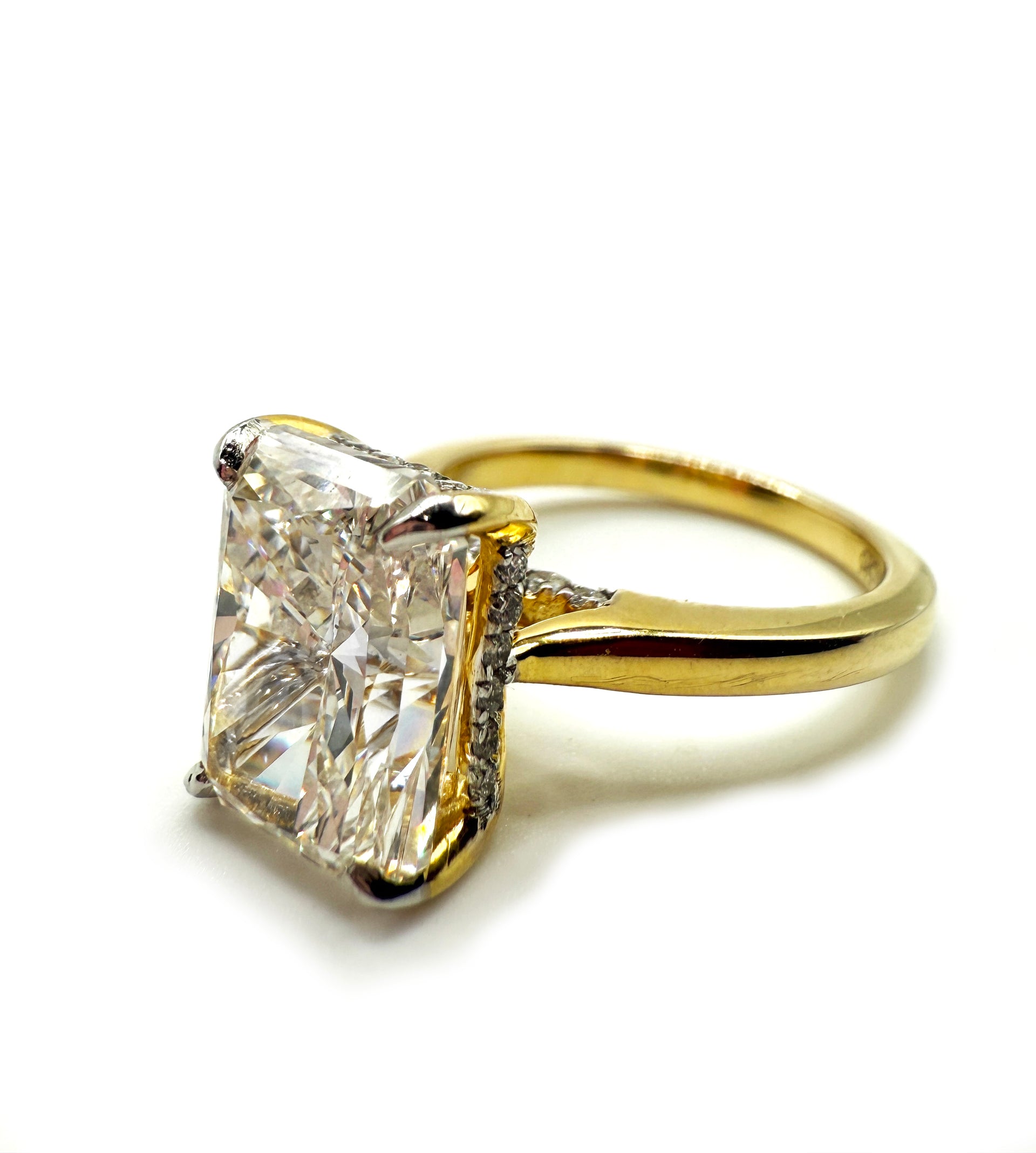 Bailey design in a 18k Yellow Gold setting. 4.09ct E VS1 Radiant cut lab grown diamond center. 2 payments