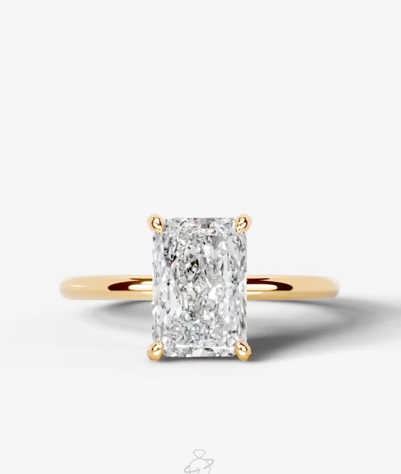 4.05ct Radiant cut Bailey setting in 14k Yellow Gold size 4.5